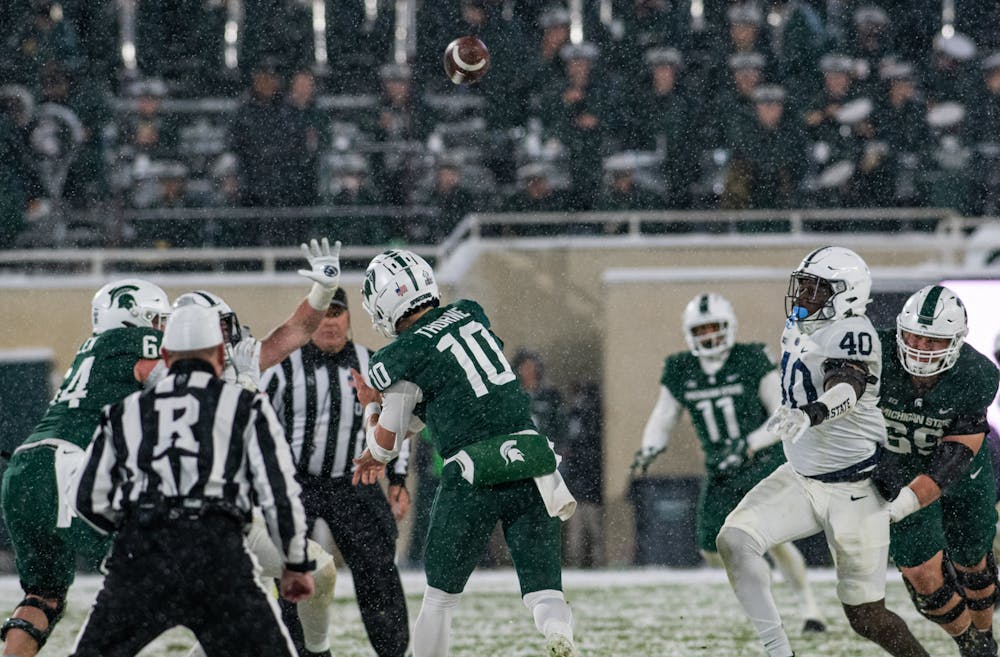 Michigan State quarterback Payton Thorne (10) throws the ball during Michigan State's victory over Penn State on Nov. 27, 2021.