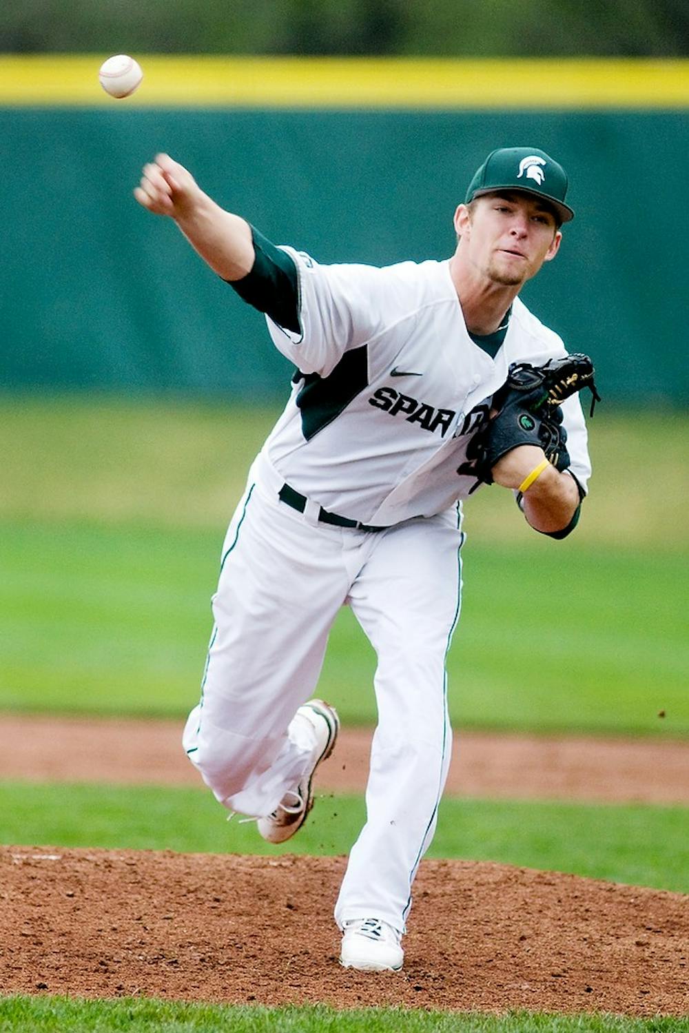 	<p>Junior pitcher Andrew Waszak throws a pitch March 24, 2012, at McLane Baseball Stadium. The Spartans defeated Oakland University 11-2 in the second game of the series. State News File Photo</p>