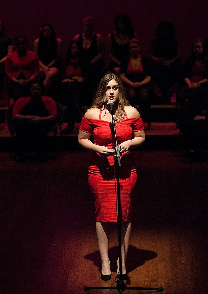 <p>Media and Information senior Laura Swanson leads the dress rehearsal for the performance of the Vagina Monologues Feb. 27, 2015, at Wharton Center for Performing Arts in the Pasant Theatre. The monologues are based on interviews with women discussing relationships, sex, violence against women and the perception of vaginas. Hannah Levy/The State News</p>