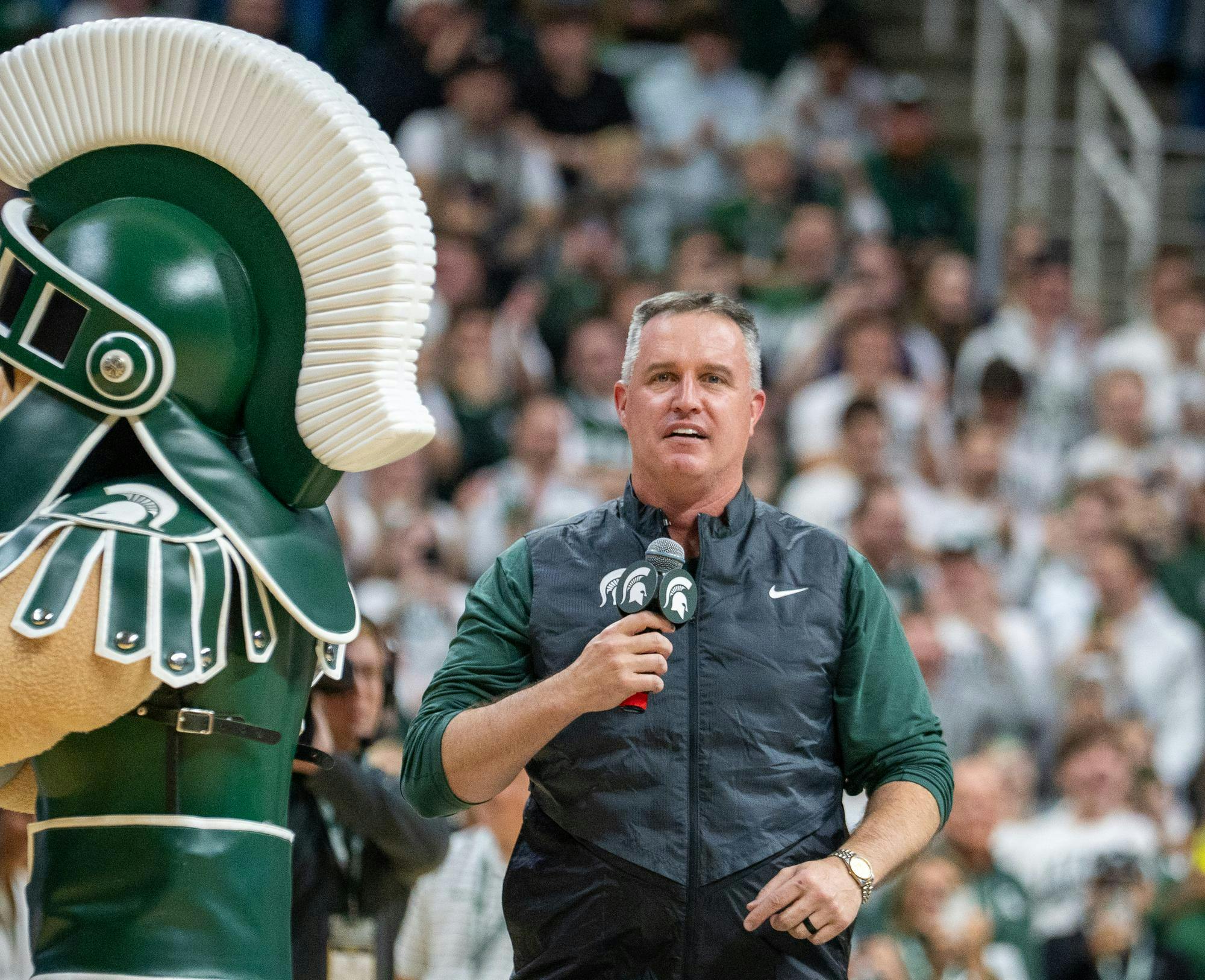 <p>New MSU football head coach Pat Fitzgerald addresses the crowd during the matchup against the University of Iowa at the Breslin Center on Dec. 2, 2025.</p>