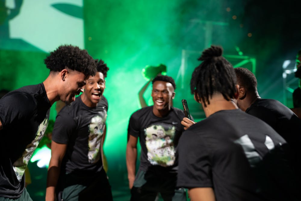 <p>Senior forward Malik Hall and teammates bust some moves at MSU Madness, held at the Breslin Center on October 8, 2022.</p>
