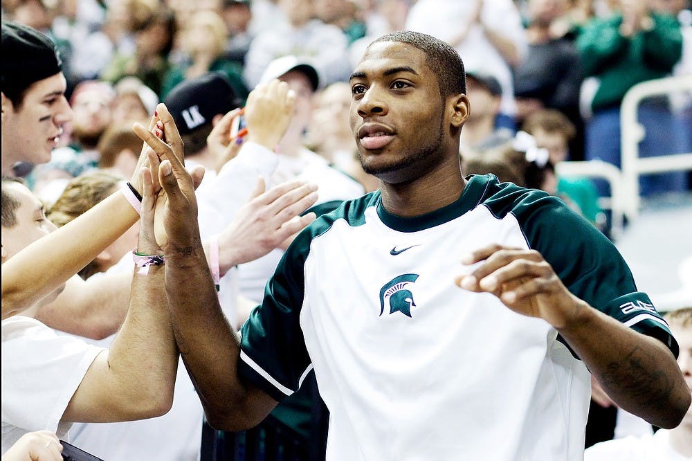 	<p>Then-freshman guard Branden Dawson interacts with fans before walking onto the court to play rival Michigan on Feb. 5, 2012, at Breslin Center. Dawson netted 10 points for the Spartans in the 64-54 victory over the Wolverines. State News File Photo</p>