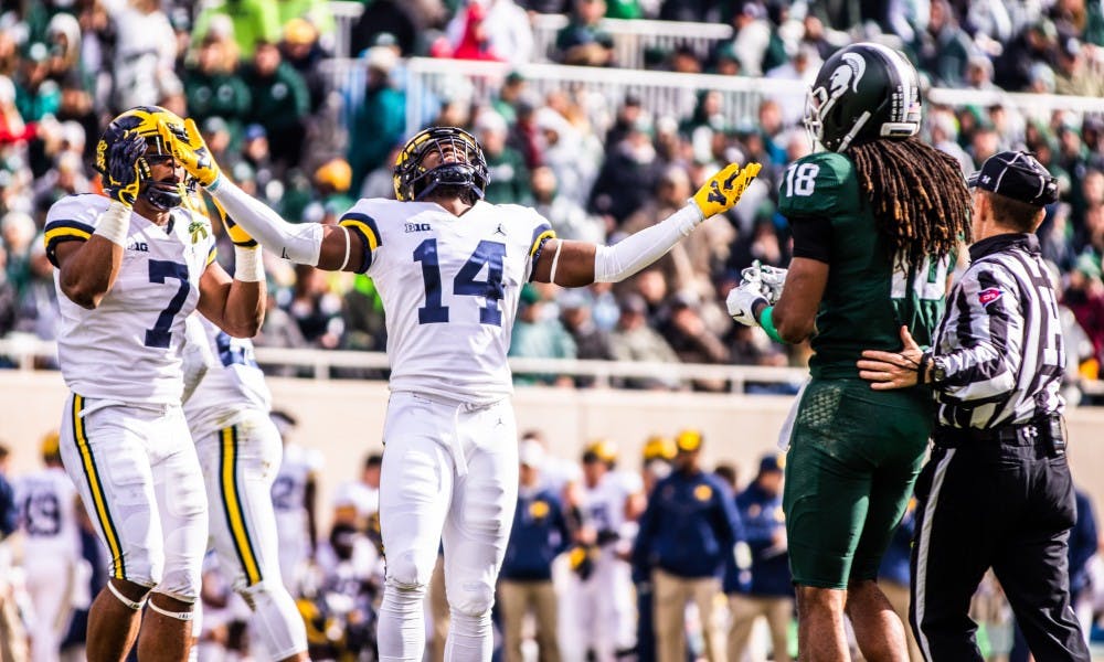 <p>Michigan defensive back Josh Metellus (14) takes in the sun during the game at Spartan Stadium Oct. 20. The Wolverines defeated the Spartans, 21-7.</p>