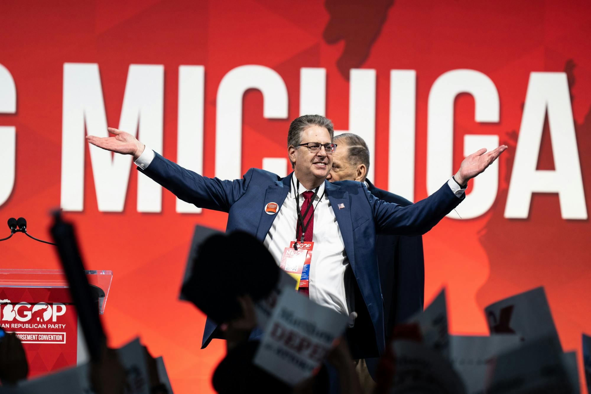 <p>Matthew Deperno, a candidate for Attorney General, basks in the cheers during his campaign at the MI GOP Endorsement Conference on April 23, 2022.</p>