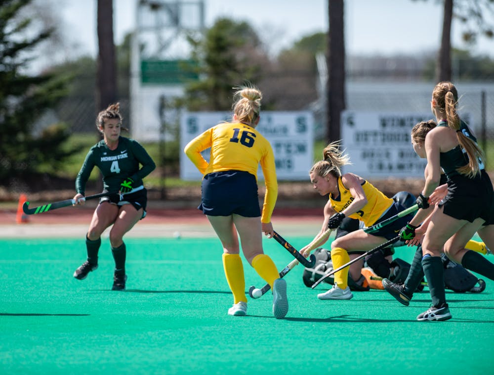 Michigan forward Tina D'Anjolell takes a shot in an away game against MSU on April 2, 2021.