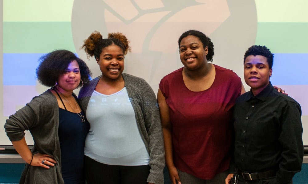 <p>The MSU Pride PoCC executive board in Wells Hall on February 13, 2019. Pictured are (left to right) Taylor Peterson, Brianna McClendon, Cyrin Watson, and Righteous Tipton.</p>