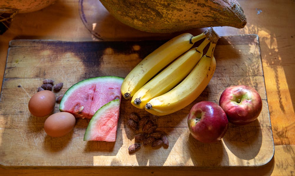 <p>A variety of different foods assembled on a cutting board in a kitchen in East Lansing on Sunday, Oct. 17, 2021.&nbsp;</p>