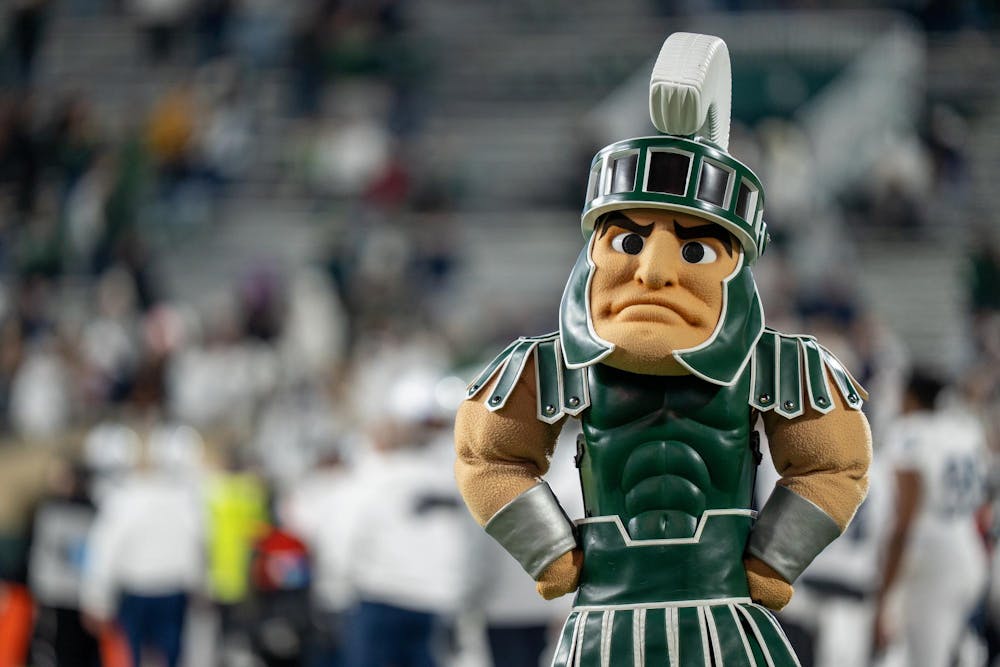 <p>Sparty walks along the sideline after Michigan State’s 28-10 loss to Penn State at Spartan Stadium in East Lansing, Mich., on Saturday, Nov. 16, 2025.</p>