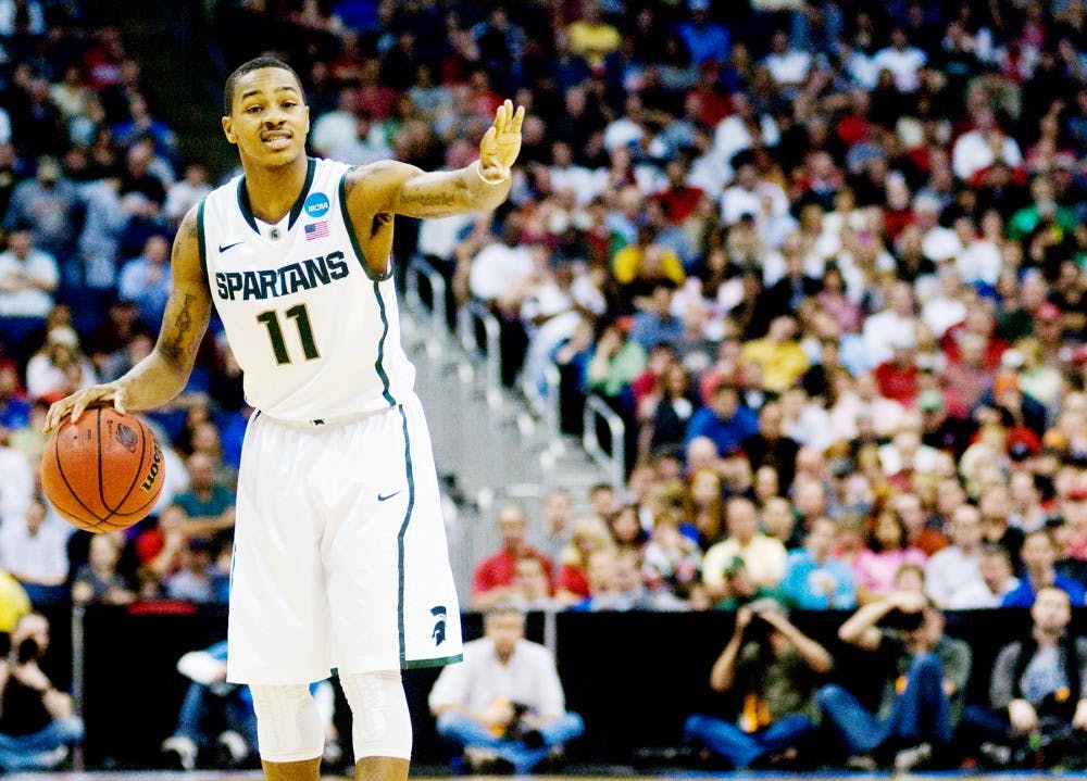 Sophomore guard Keith Appling takes charge of the court Sunday afternoon at Nationwide Arena, Columbus, Ohio. Appling had three assists in the 65-61 Spartan victory over the St. Louis Billikens. Jaclyn McNeal/The State News. 