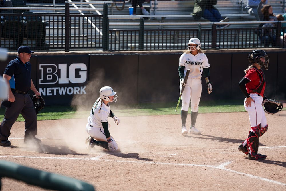 <p>Michigan State senior Abby Joseph stealing home in the third inning. Spartans lost 5-4 against Nebraska, on April 10, 2022.</p>