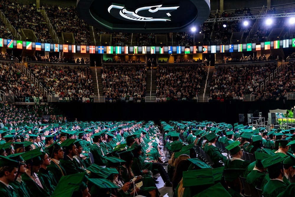 Graduates sit during the Michigan State University College of Communication Arts and Sciences graduation ceremony at the Breslin Student Events Center on Michigan State University’s campus in East Lansing, Mich., on Friday, May 1, 2026.