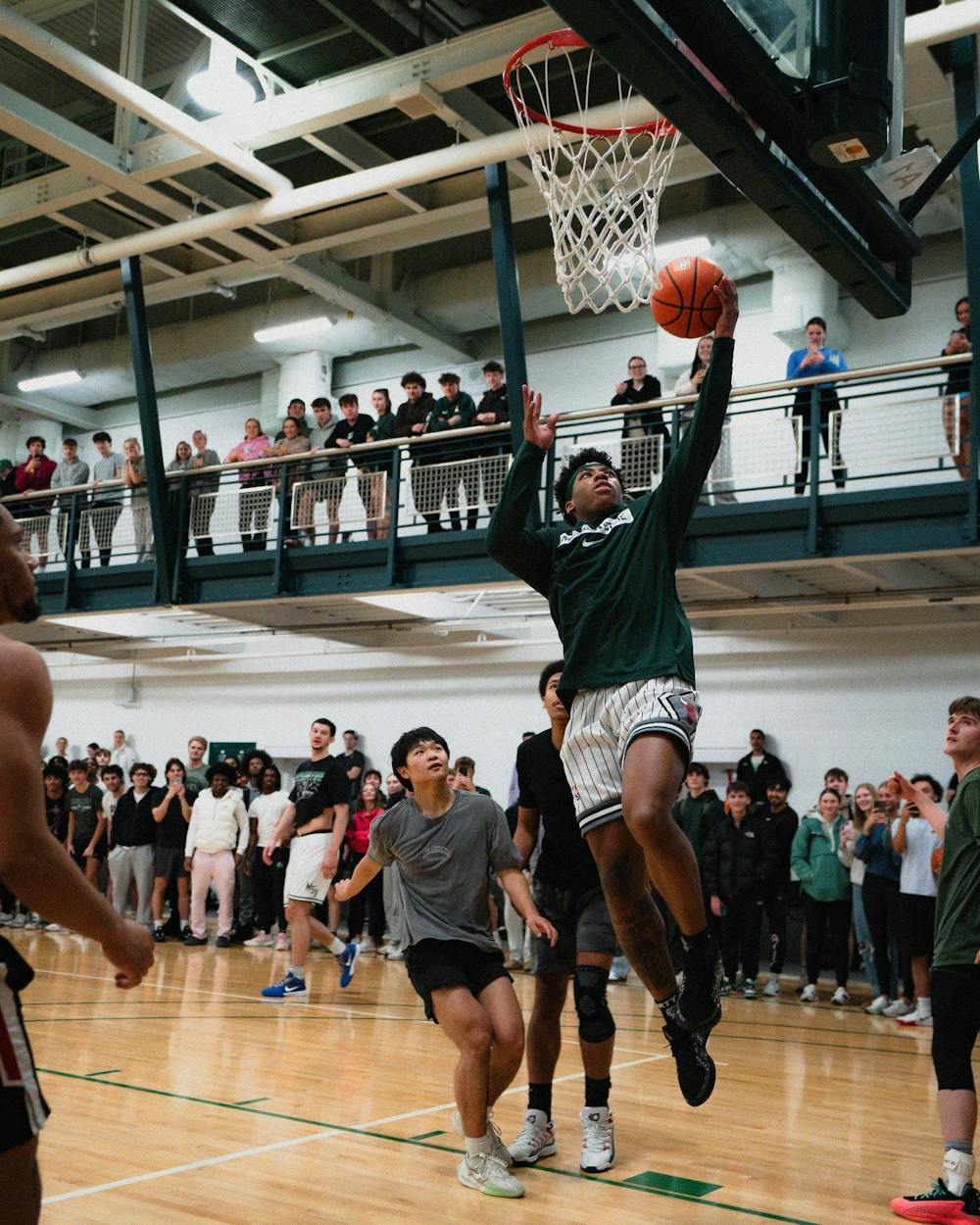 <p>Michigan State sophomore guard Jeremy Fears Jr. drives towards the rim at IM East on April 16, 2025. The men's basketball team showed off their skills during pickup runs for students to watch.</p>