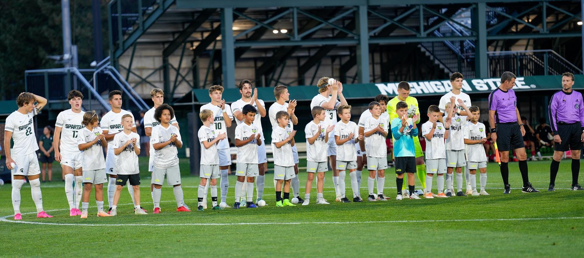 Michigan State University’s Men’s soccer team lined up before the game against Indiana University at DeMartin Soccer Field on Sept. 22, 2023.