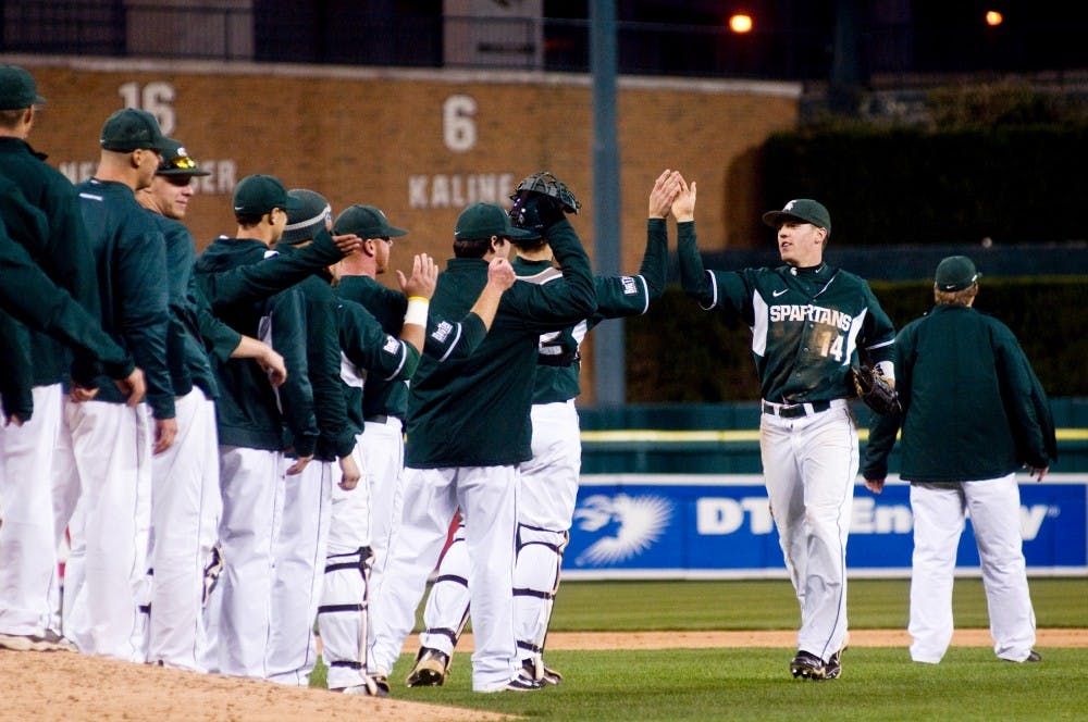 	<p>Senior left fielder Brandon Eckerle celebrates with his teammates Wednesday at Comerica Park in Detroit. The Spartans defeated the Central Michigan Chippewas 3-1. Matt Radick/The State News</p>