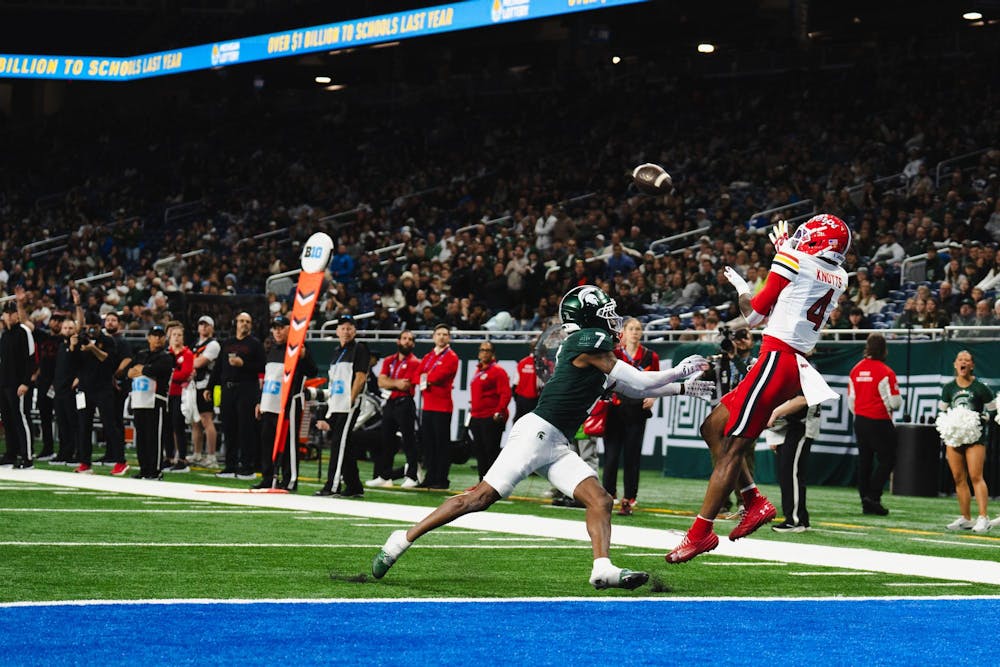 <p>Maryland senior wide receiver Shaleak Knotts (4) catches the ball for a touchdown at the Ford Field Stadium in Detroit, MI, on Nov. 29, 2025.</p>