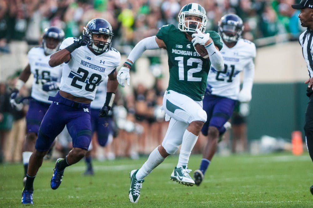 Senior wide receiver R.J. Shelton (12) runs down the field for an 86 yard touchdown pass during the third quarter in the game against Northwestern on Oct. 15, 2016 at Spartan Stadium. The Spartans were defeated by the Wildcats, 54-40.