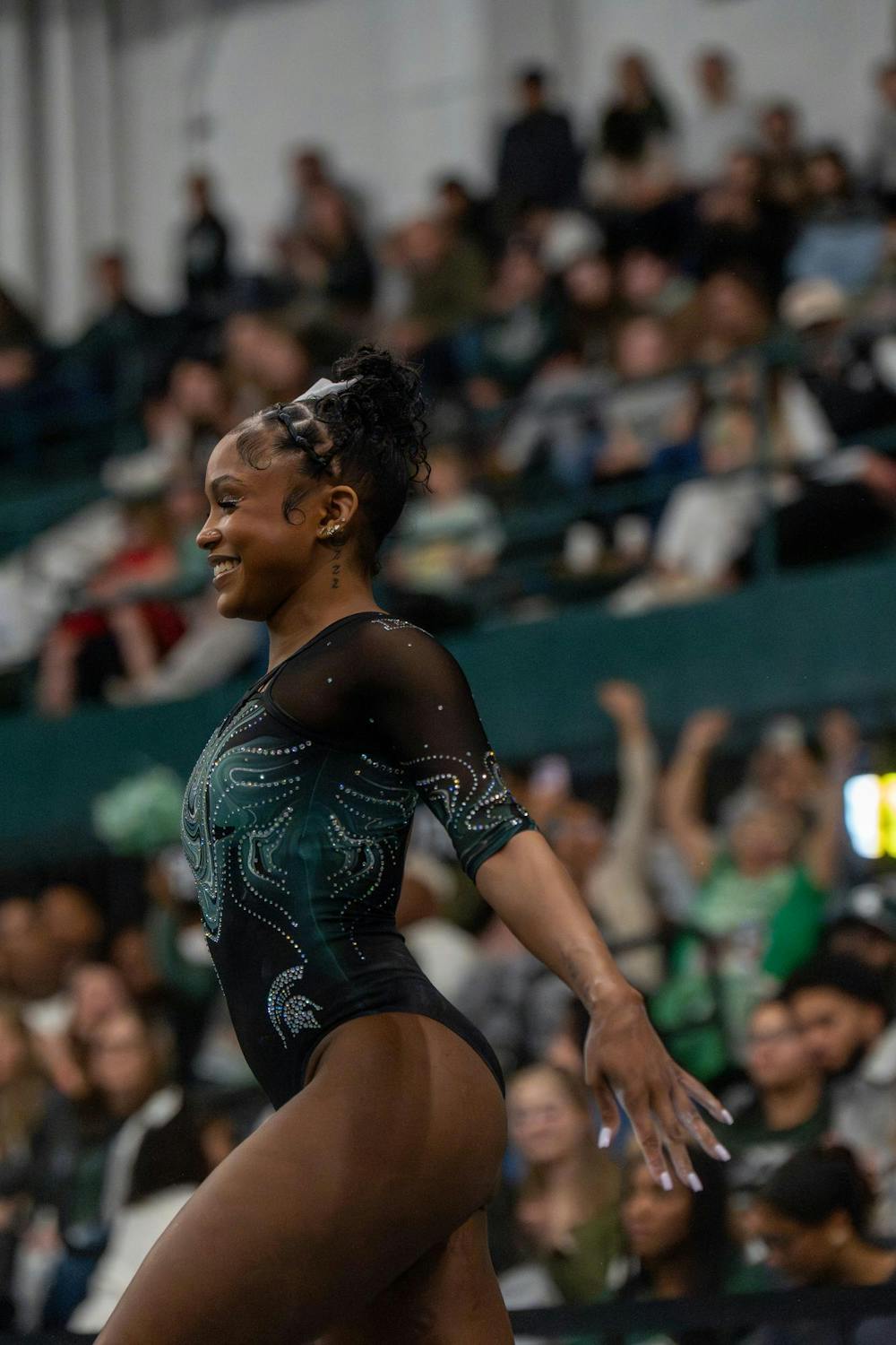 <p>Nikki Smith prepares to begin her floor routine during Michigan State’s meet against Brown at Jenison Field House in East Lansing, Mich., on Sunday, March 15, 2026.</p>