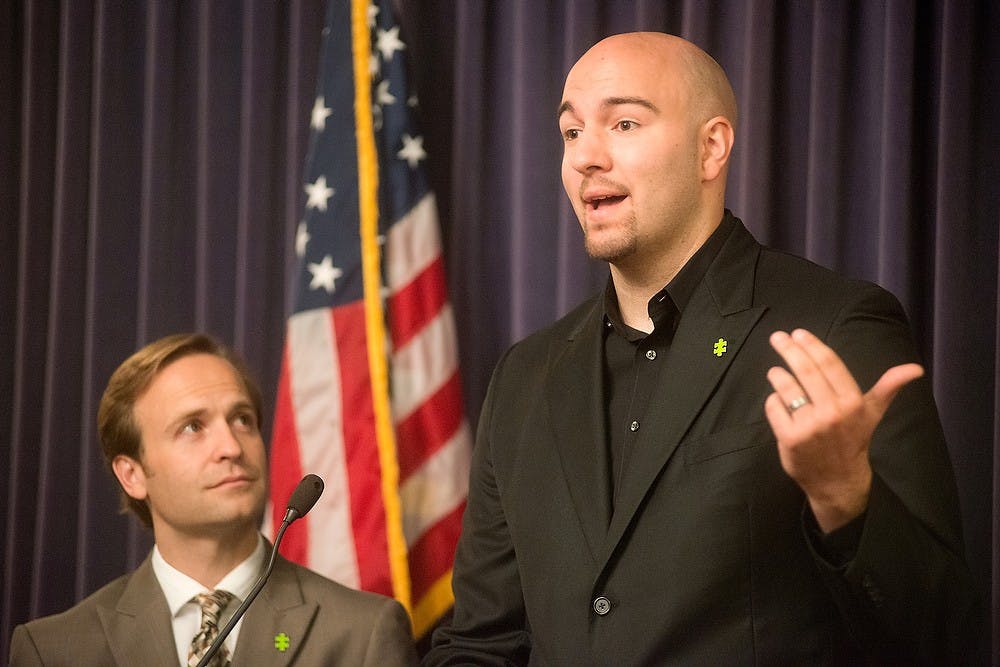 	<p>Lt. Gov. Brian Calley and former <span class="caps">MSU</span> basketball player Anthony Ianni discuss the Autism Alliance of Michigan&#8217;s anti-bullying initiative Oct. 17, 2013, at the Capitol building. Ianni will speak to middle schools across the state in hopes of ending bullying. Julia Nagy/The State News </p>