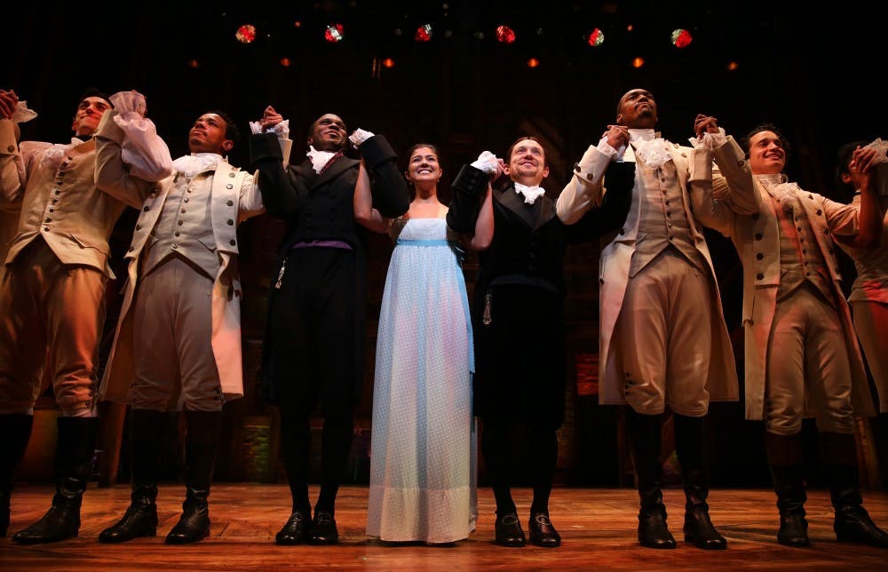 The cast of Hamilton takes a bow during a curtain call as the production makes its Chicago premiere on Wednesday, Oct. 19, 2016 at PrivateBank Theatre in Chicago, Ill. (Chris Sweda/Chicago Tribune/TNS)