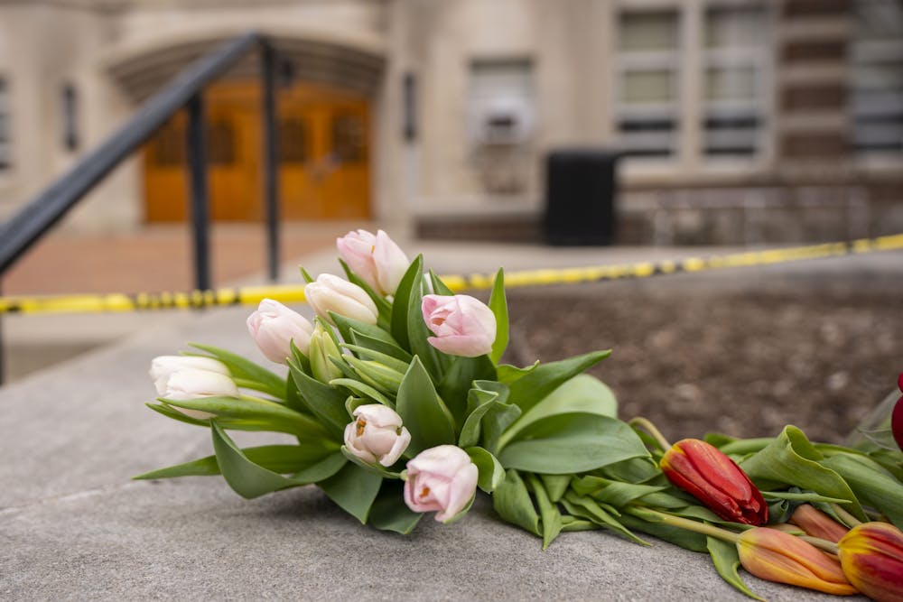 Flowers outside of Berkey Hall on Wednesday, Feb. 15, 2023 - two days after the mass shooting in Michigan State University’s north campus. 