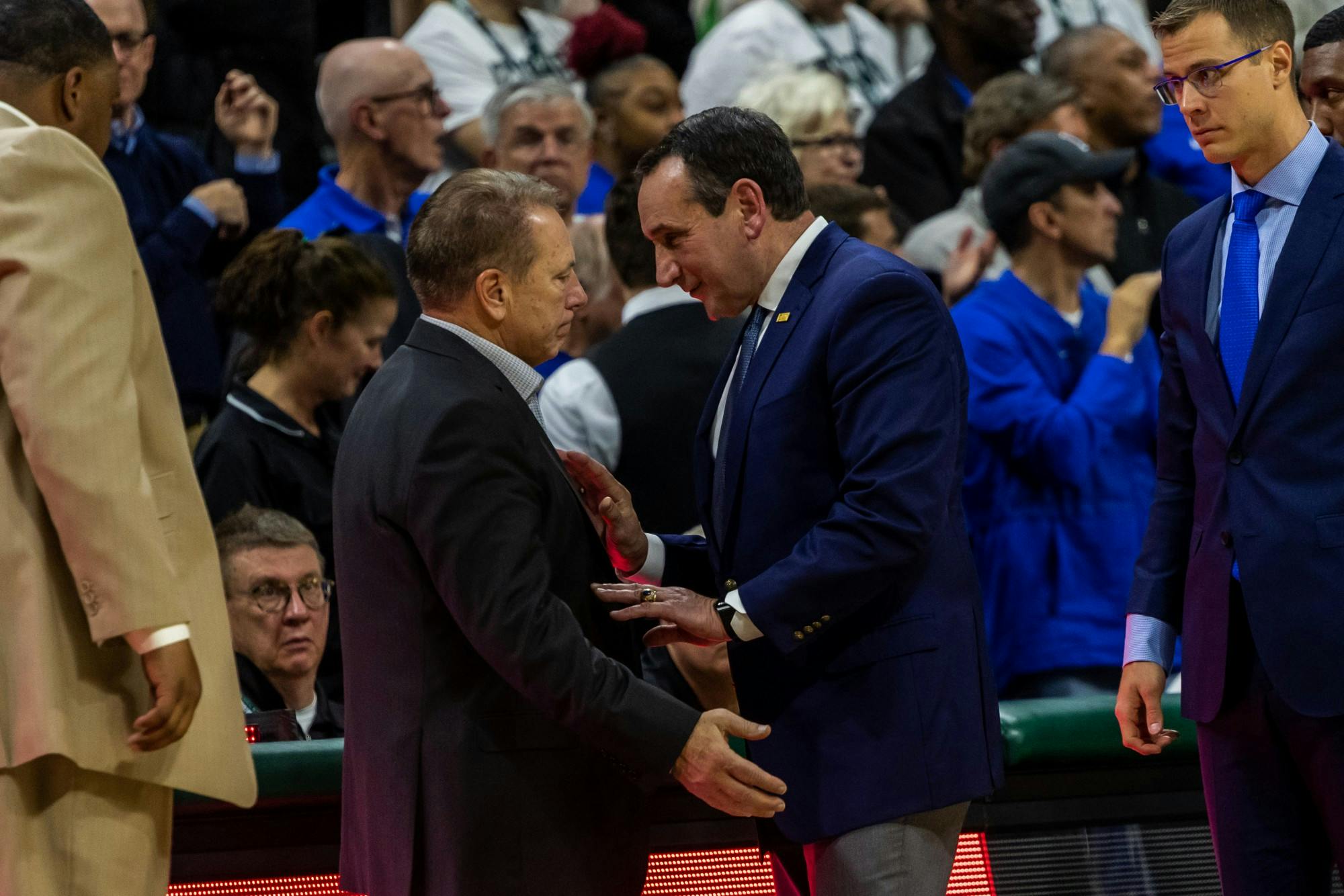 <p>MSU Head Coach Tom Izzo (left) and Duke Head Coach Mike Krzyzewski interact following Duke defeating MSU. The Blue Devils defeated the Spartans, 87-75, at the Breslin Student Events Center on Dec. 3, 2019. </p>