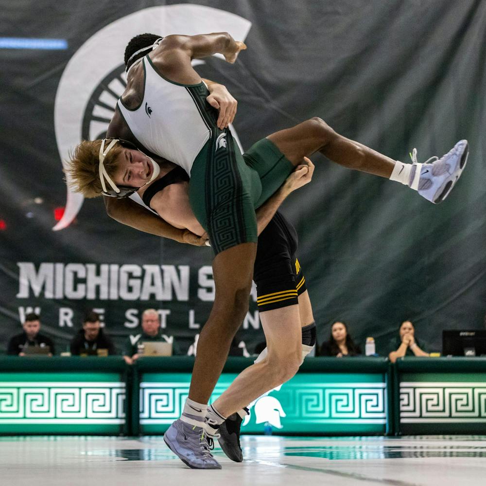 MSU R-So. Wt. 141/149, Clayton Jones, gets picked up by an Iowa wrestler in the Jenison Field House in East Lansing, MI on Feb. 8, 2026.