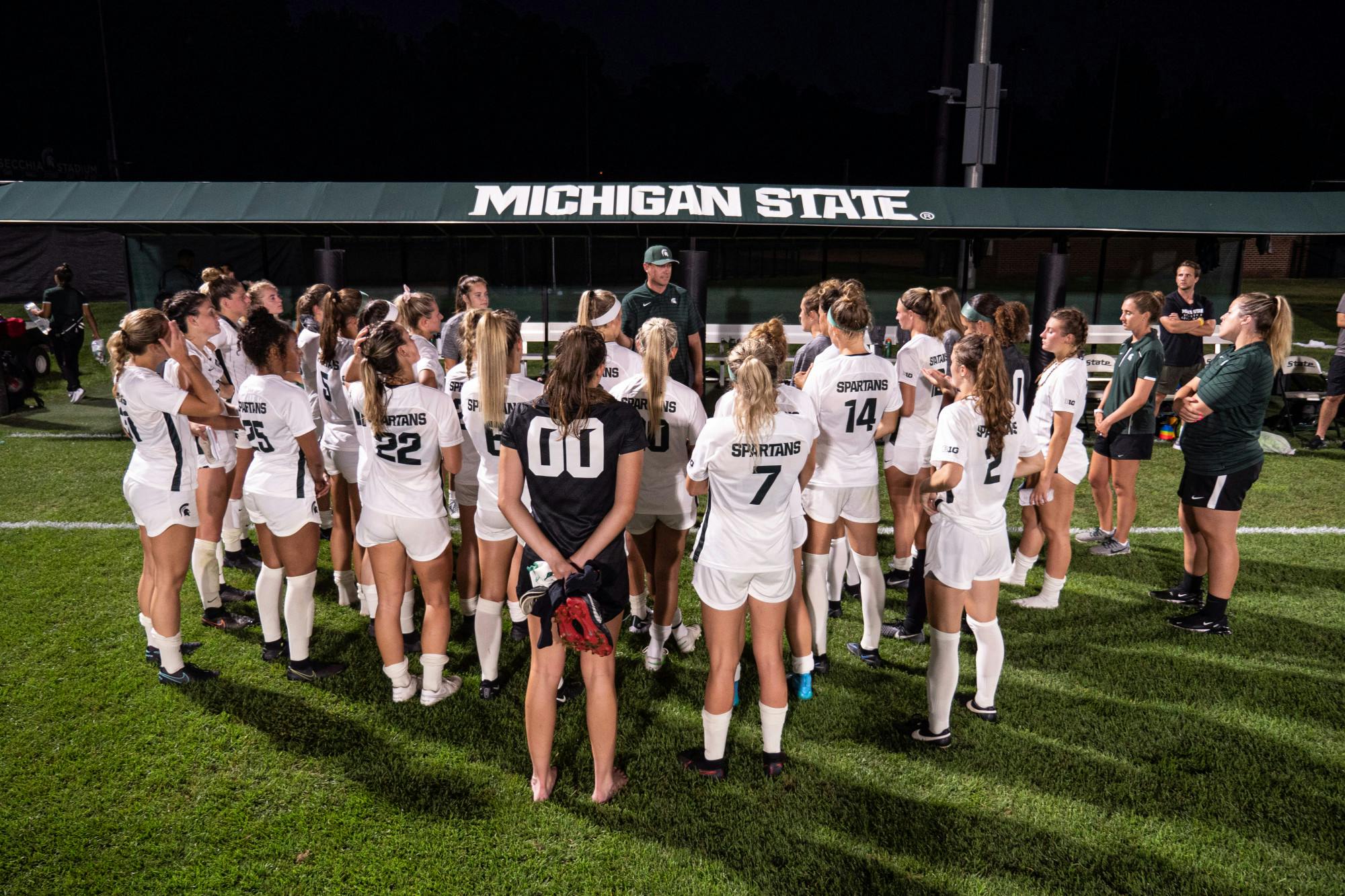 Michigan State Head Coach Jeff Hosler addresses his team, photo courtesy of MSU Athletics and Maria Babcock.