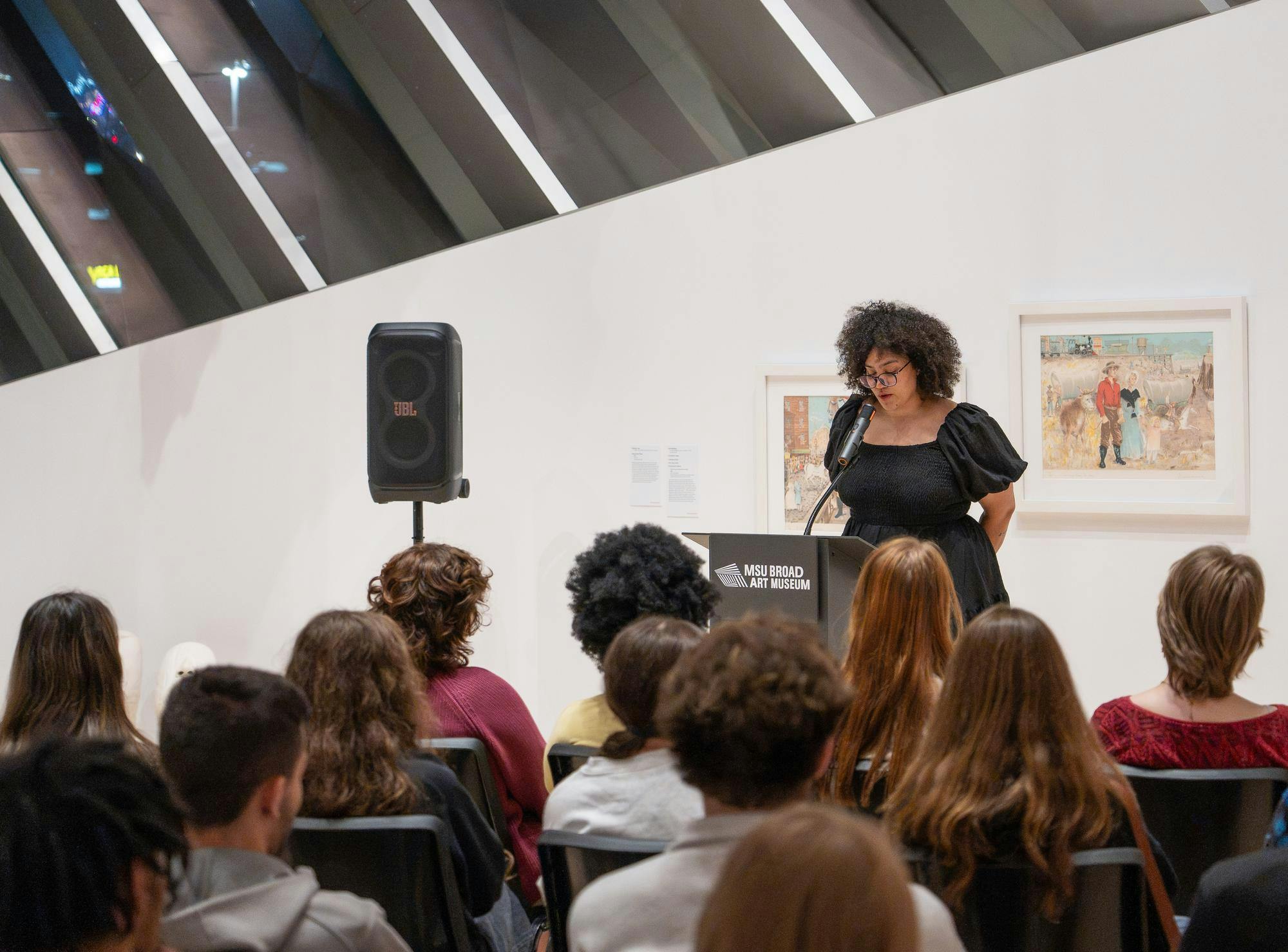 <p>Guest poet Sasha Debevec-McKenney reads one of her poems as she participates in an event at the Broad Art Museum in East Lansing, Mich., on Wednesday, Oct. 14, 2026.</p>