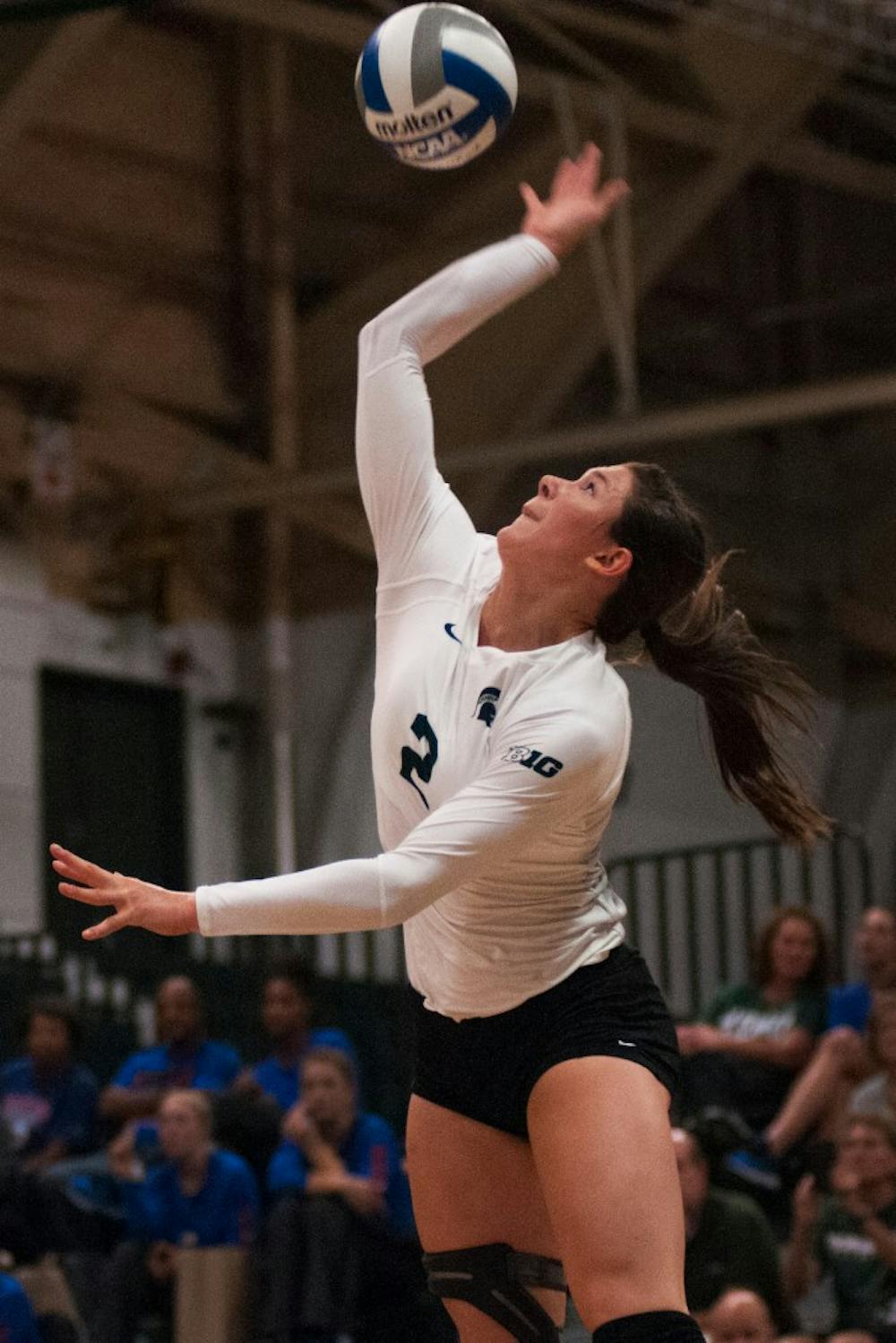 Junior outside hitter Autumn Bailey (2) hits the volleyball during the volleyball game against Notre Dame on Sept. 16, 2016 at Jenison Field House. The Spartans defeated the Fighting Irish, 3-0.