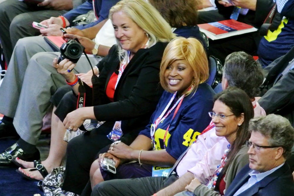 Michigan delegate at large Linda Lee Carver, second women from left, smiles after taking with fellow Michigan delegates on Tuesday Aug. 28, 2012 at the Tampa Times Forum at Tampa, Fla. Justin Wan/The State News