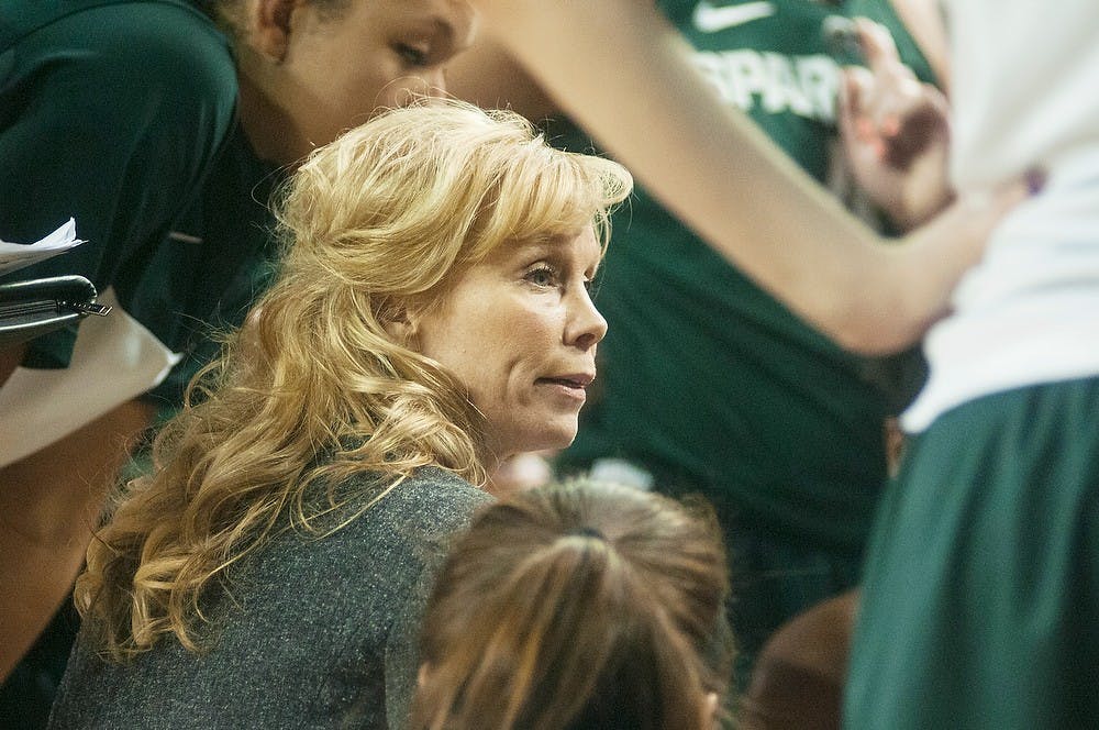 	<p>Head coach Suzy Merchant talks to her team during a timeout in the second half of the game against Michigan on Jan. 12, 2014, at Crisler Center in Ann Arbor, Mich. The Spartans defeated the Wolverines, 79-72. Danyelle Morrow/The State News</p>