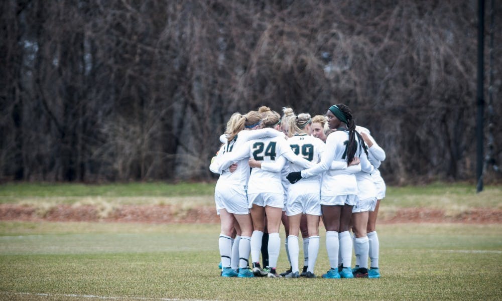 The Spartans gather just before the game against Bowling Green State University on March 25, 2017 at DeMartin Stadium. The Spartans defeated the Falcons, 5-1.