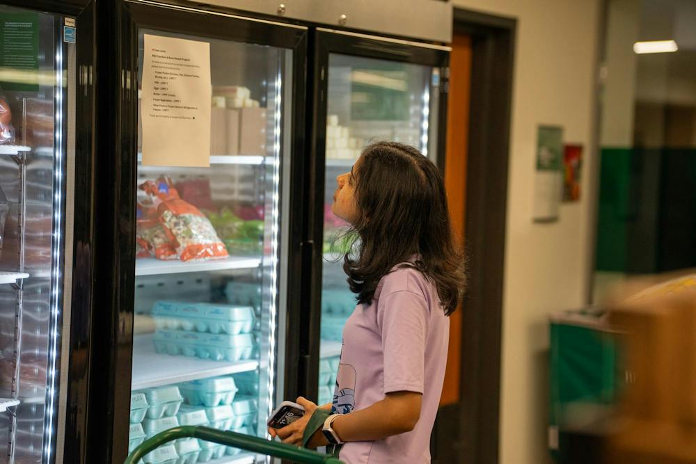 A student shops at the Michigan State University Student Food Bank in the MSU Union in East Lansing, Mich., Thursday, Sept. 18, 2025.