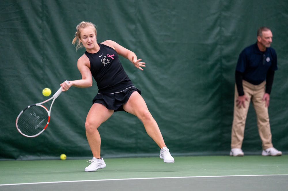 <p>Sophomore Liisa Vehvilainen returns the ball during her singles match against Minnesota at the MSU Tennis Center on March 25, 2023. The Spartans defeated the Gophers 4-0.</p>