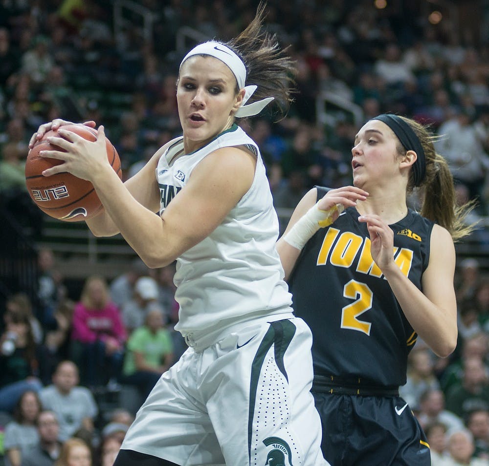 <p>Sophomore guard Tori Jankoska tries to maintain possession of the ball from Iowa guard Ally Disterhoft Jan. 18, 2015, during the game against Iowa at Breslin Center. The Spartans were defeated by the Hawkeyes, 52-50. Erin Hampton/The State News</p>