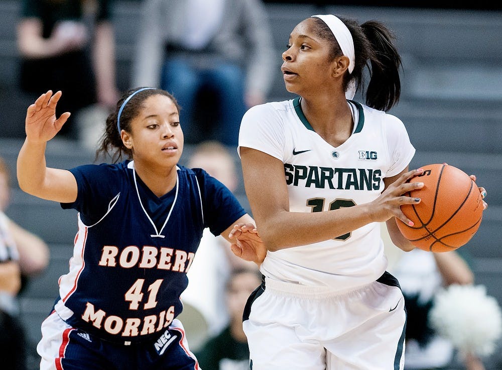 	<p>Freshman guard Branndais Agee looks to pass the ball while Robert Morris guard Randi Jackson tries to block on Sunday, Nov. 25, 2012, at Breslin Center. The Spartans defeated the Colonials 68-35. Julia Nagy/The State News</p>