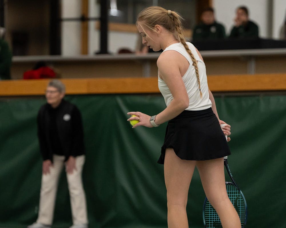 <p>MSU redshirt sophomore Hanna Tsitavets gets ready to serve against Xavier in a doubles match at the MSU Indoor Tennis Center on Jan. 24, 2025. Tsitavets went on to win match six to four.</p>