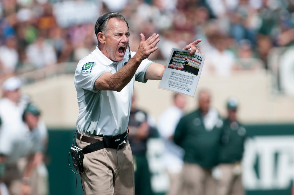 <p>Head coach Mark Dantonio yells to his team in the second quarter during the game against Central Michigan on Sept. 26, 2015, at Spartan Stadium. The Spartans defeated the Chippewas, 30-10. Julia Nagy/The State News </p>