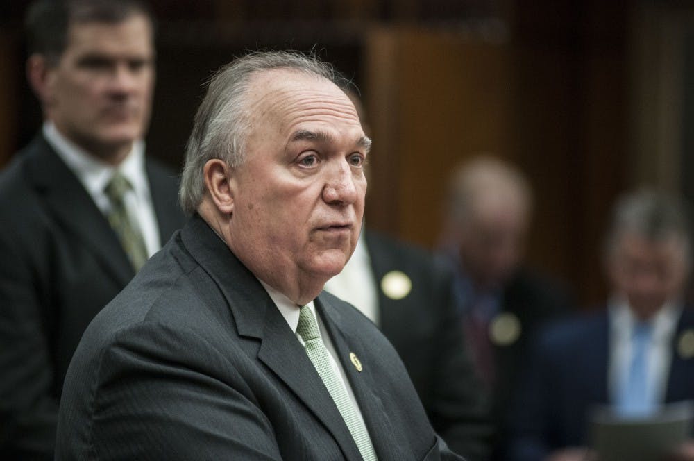Newly appointed interim president John Engler addresses the media on Jan. 31, 2018, at Hannah Administration Building. (C.J. Weiss | The State News)