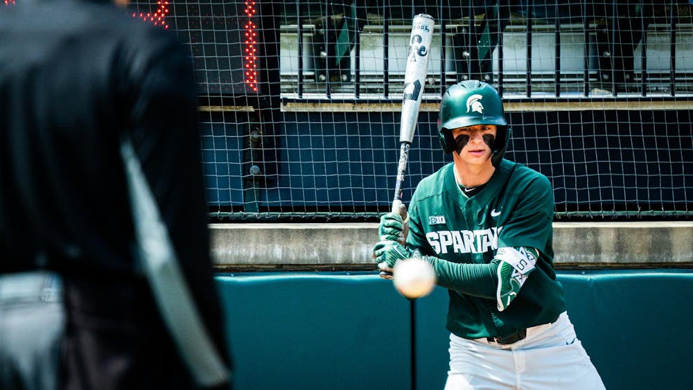 MSU junior infielder Randy Seymour (35) watches a warm up pitch in-between innings during a game at McLane Stadium on April 13, 2025.