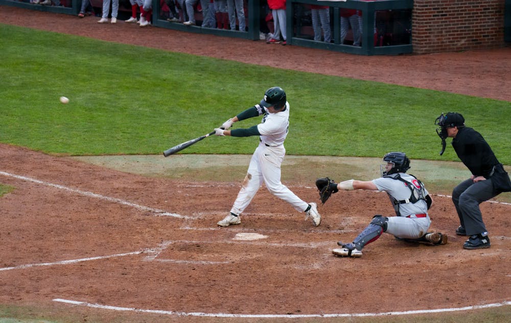 <p>Michigan State sophomore Jack Frank sends the ball flying, hitting a home run against Youngtown State at McLane Baseball Stadium on March 30, 2022. Spartans are victorious 12-5 against Youngtown State.</p>