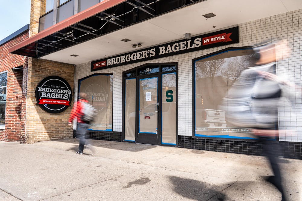 <p>MSU students pass by Brueggers Bagels after its closing on Grand River Ave. in East Lansing, MI on March 25, 2026.</p>