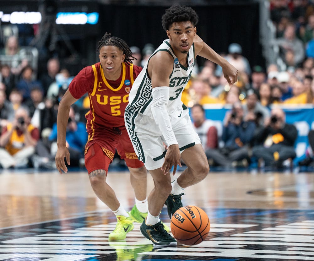 <p>Sophomore guard Jaden Akins steals the ball at Nationwide Arena in Columbus, Ohio on March 17, 2023. The Spartans beat the Trojans, 72-62 in the first round of March Madness.</p>
