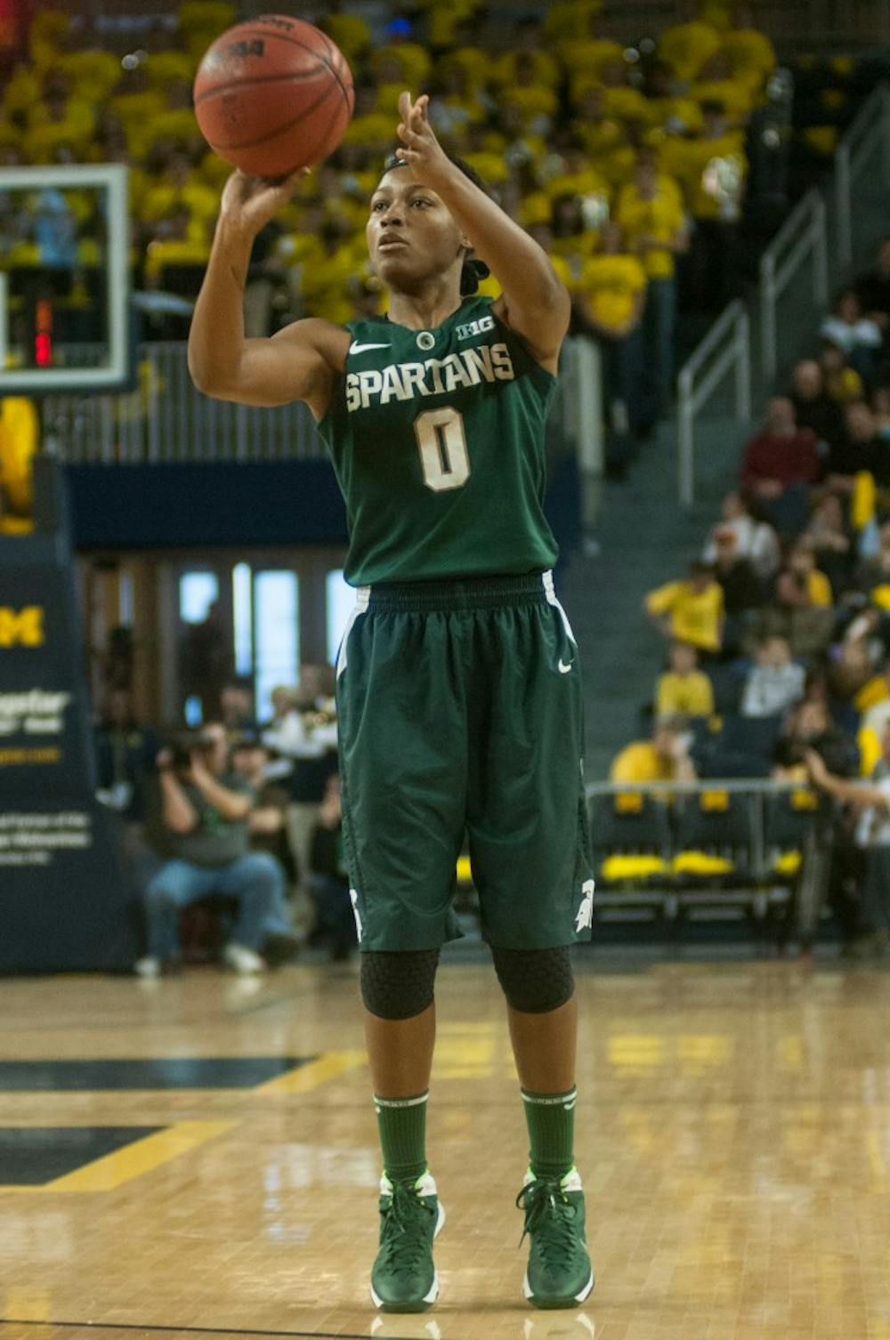 	<p>Junior guard Kiana Johnson shoots a three-pointer during the game against Michigan on Jan. 12, 2014, at Crisler Center in Ann Arbor, Mich. The Spartans defeated the Wolverines, 79-72. Danyelle Morrow/The State News</p>