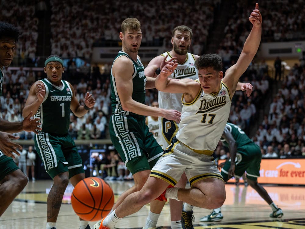 Purdue University's freshman guard Omer Mayer (17) loses possession vs. Michigan State at Mackey Arena in West Lafayette, Indiana on Thursday, Feb. 26, 2026. 