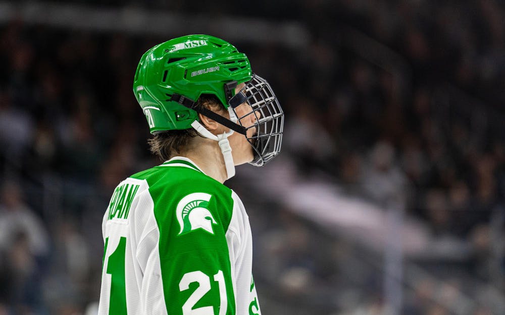 MSU Fr. F, Anthony Romani (21), gets ready for his game in the 80's retro jersey in Munn Ice Arena in East Lansing, MI on Feb. 19, 2026.