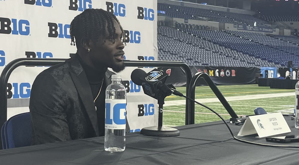 <p>Michigan State senior wide receiver Jayden Reed speaks with the press at Big Ten Media Days.</p>