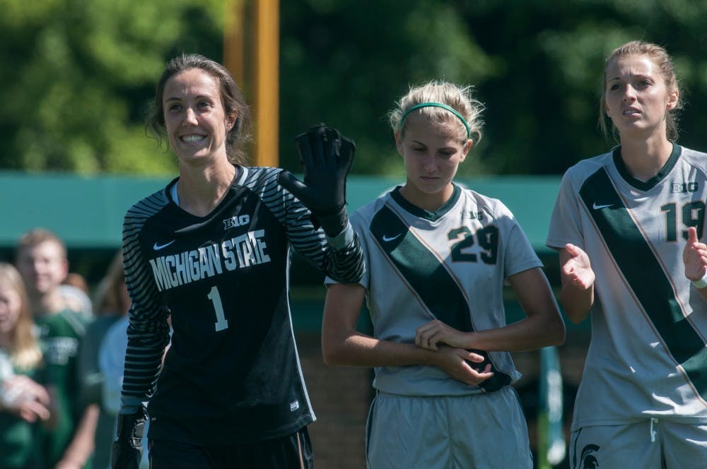 Senior goalkeeper Kaitlyn Collin (1) waves during pre-game introductions before a game against the University of Detroit on Sept. 11, 2016 at DeMartin Stadium at Old College Field. The Spartans defeated the Titans, 2-0. 