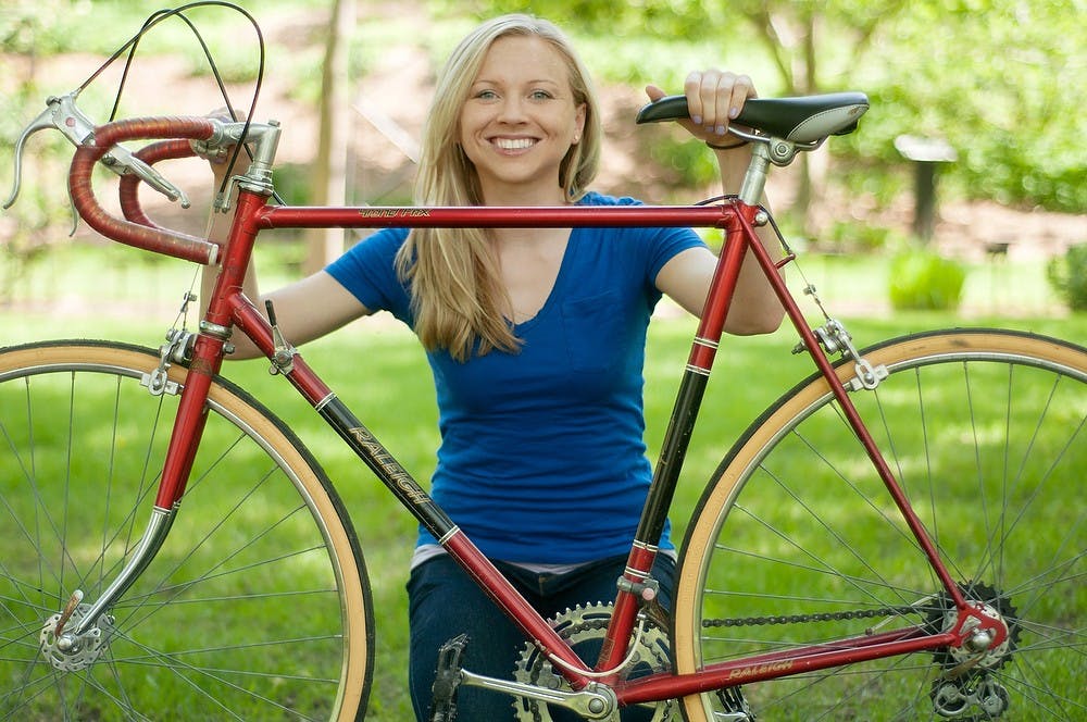 	<p>Graduate student Jackie Saunders poses for a portrait on May 15, 2013 at Beal Botanical Garden. Jackie will be riding from East Lansing to St. Clair Shores, Mich., to raise money for the Michigan Lupus Foundation. Weston Brooks/The State News</p>