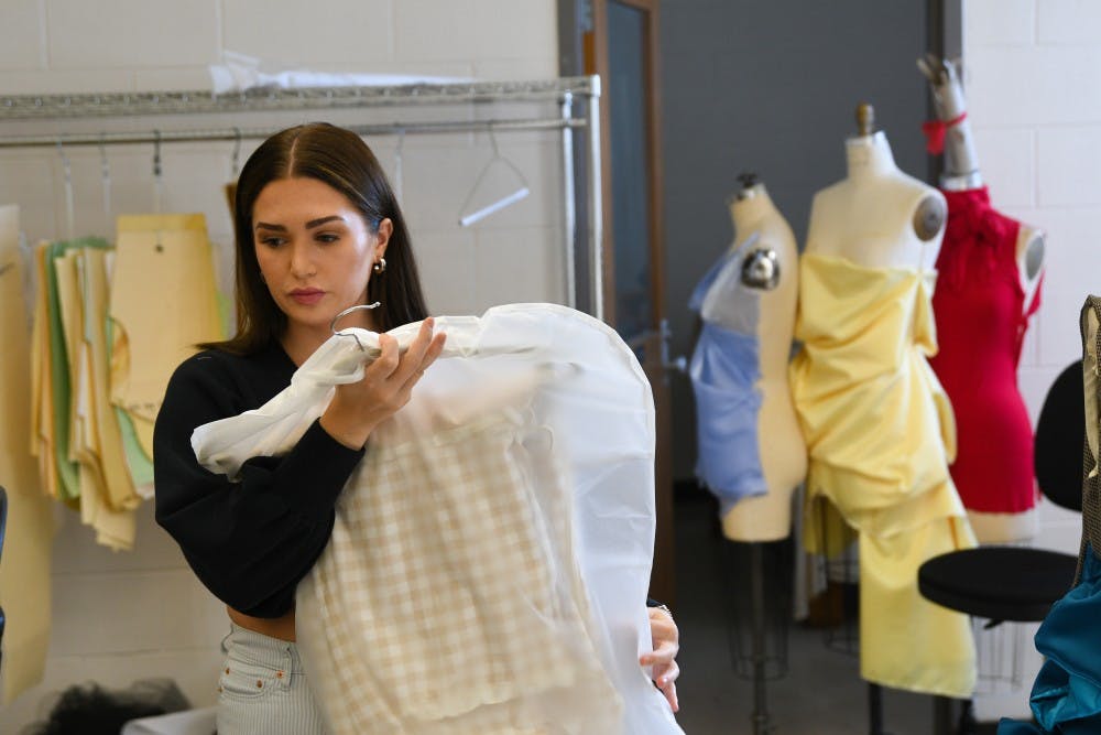 Apparel and textile design major and MSU senior Mikayla Frick works in her studio at the Urban Planning and Landscape Architecture building on October 15, 2019. 